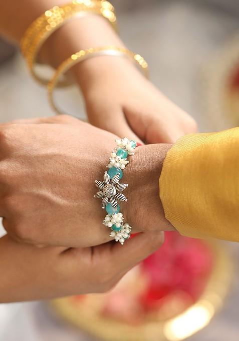 Swastik Motif And Mogra Beaded Bhaiya Bhabhi Rakhi With Roli And Chawal