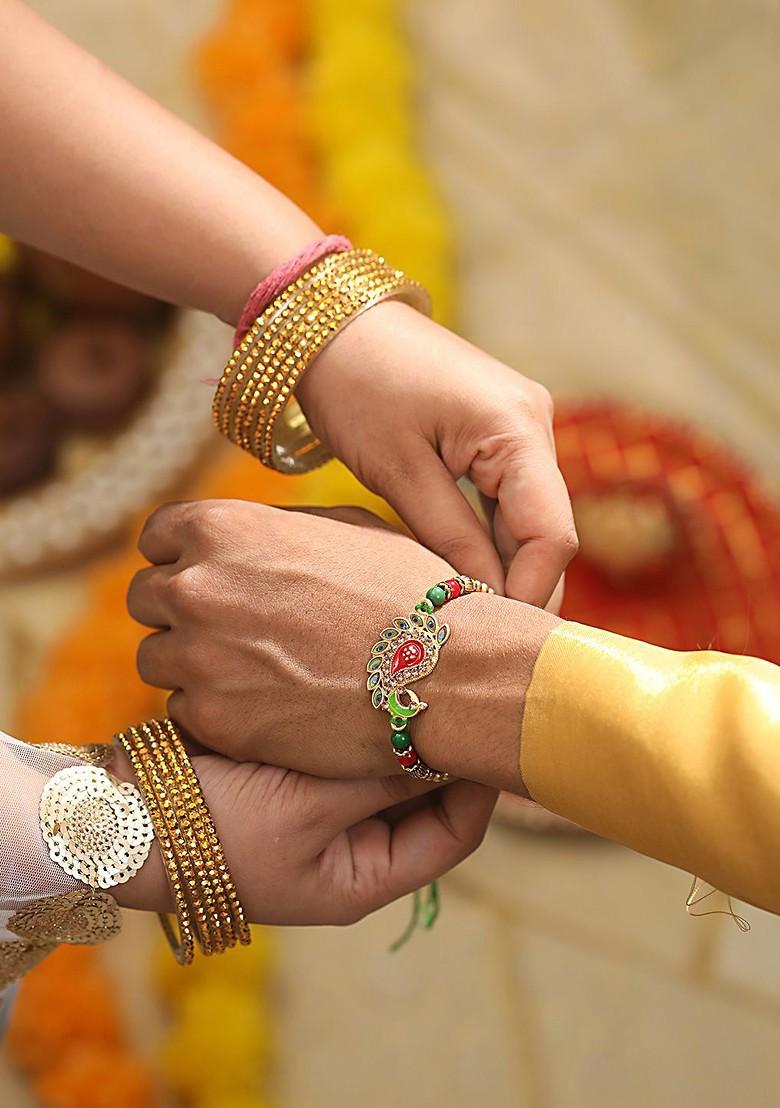Peacock Shaped Meena Work Bhaiya Bhabhi Rakhi With Roli And Chawal