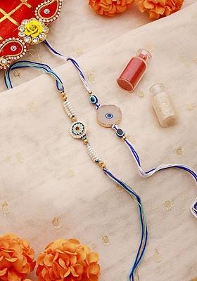 Set Of 2 Evil Eye And Pearl Beaded Charm Rakhi With Roli And Chawal
