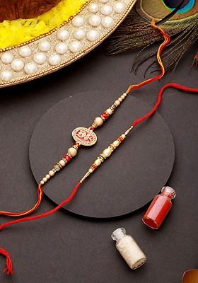 Set Of 2 Trishul Enamelled And Faux Pearl Beaded Rakhi With Roli Chawal