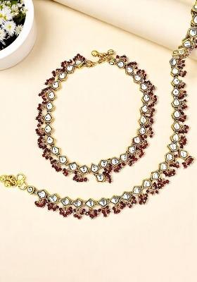 Gold Plated Kundan And Maroon Beads Studded Anklet