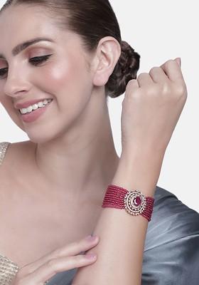 Pink Studded Gold Plated Bangles And Bracelets