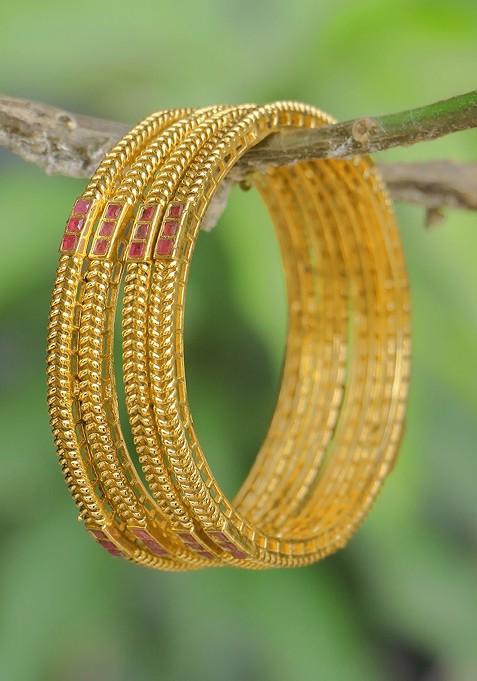 Gold Stone Studded And Beaded Gold Plated Bangle