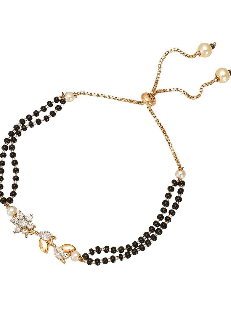 Women Gold Plated And Black Brass American Diamond Hand Mangalsutra Link Bracelet