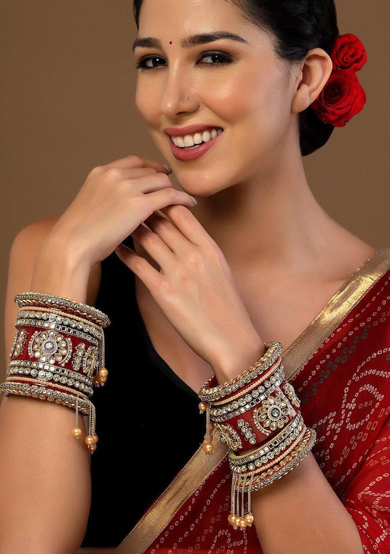 Set Of 18 Gold Plated Stone Studded And Pearls Beaded Bangles