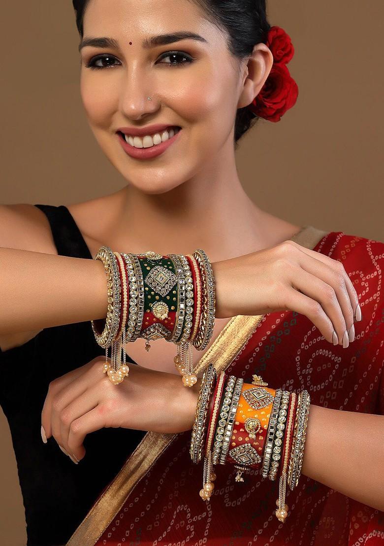 Set Of 18 Gold Plated Stone Studded And Pearls Beaded Bangles