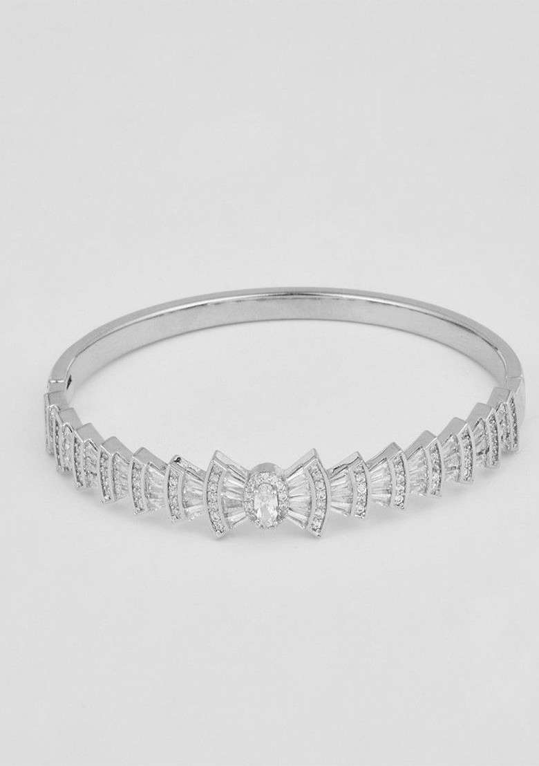 Rhodium Plated American Diamond Studded Bow Shaped Openable Bangle Style Bracelet - Indya