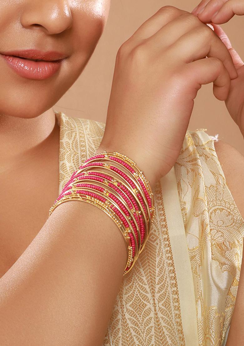 Set Of 12 Gold Plated Stone Studded And Beaded Bangles