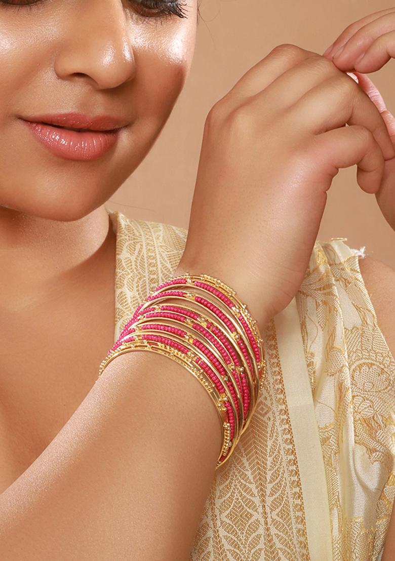 Set Of 12 Gold Plated Stone Studded And Beaded Bangles