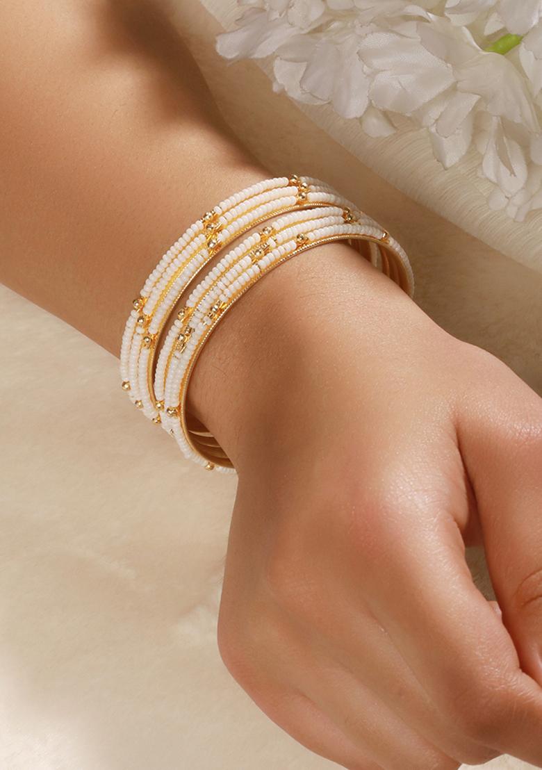 Set Of 12 Gold Plated Beaded And Studded Bangles