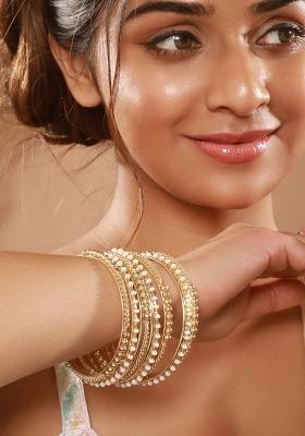 Set Of 12 Gold Plated Stone Studded And Beaded Bangles