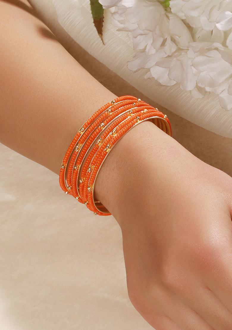 Set Of 12 Gold Plated And Beaded Studded Bangles