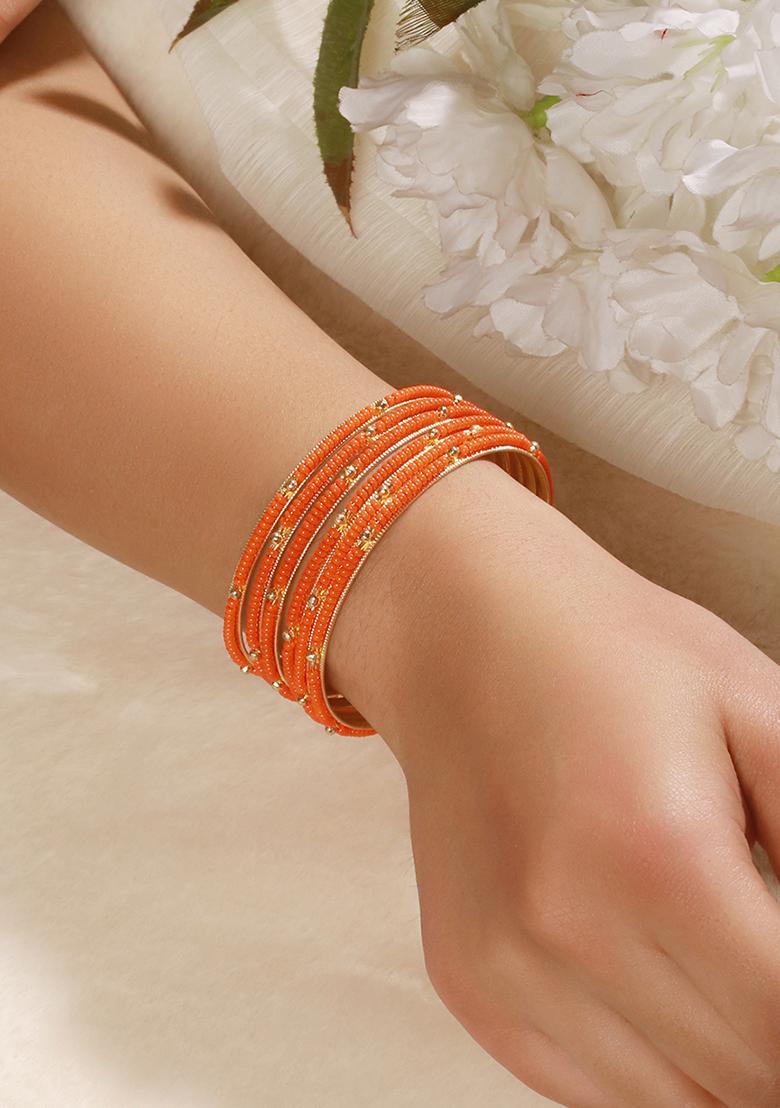 Set Of 12 Gold Plated And Beaded Studded Bangles