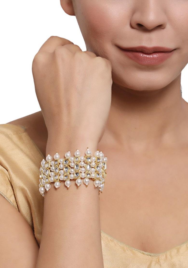 Women Gold Toned And White Pearl And Stone Studded Wraparound Bracelet
