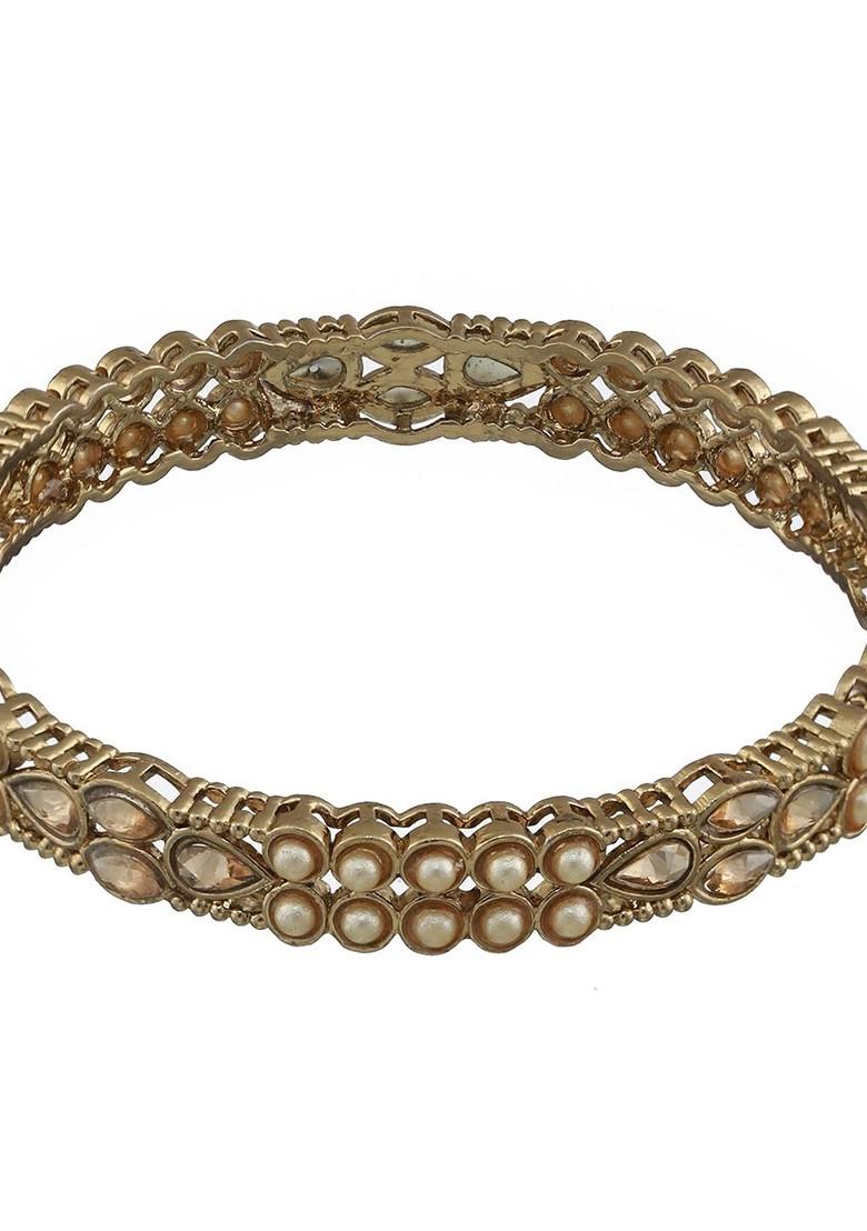 Set Of 4 Gold Plated Kundan Studded And Pearls Beaded Bangles