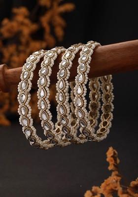Set Of 4 22Kt Gold Plated Kundan Studded And Beaded Bangles
