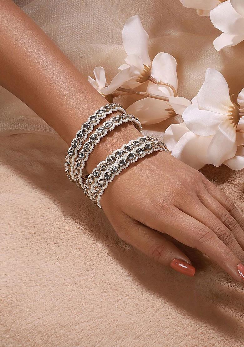 Set Of 4 22Kt Gold Plated Kundan Studded And Beaded Bangles