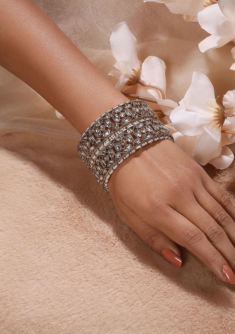 Set Of 2 Gold Plated Kundan Studded And Pearl Beaded Bangle