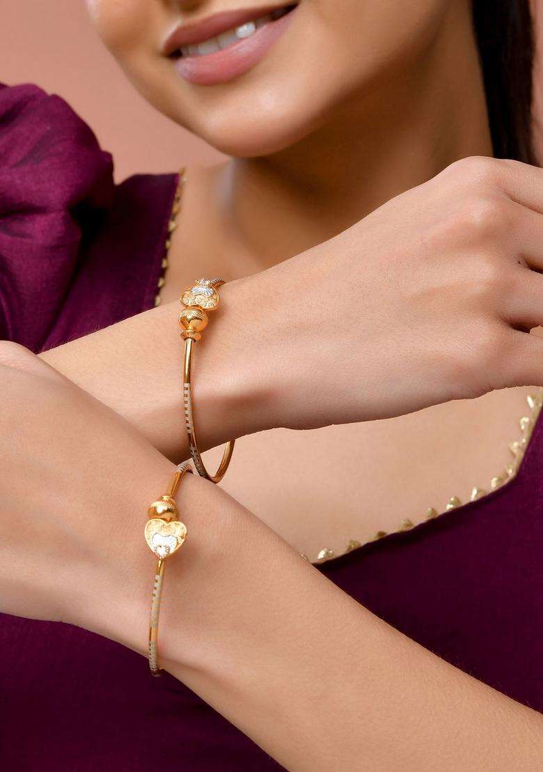 Gold Stainless Steel Bangles - Indya