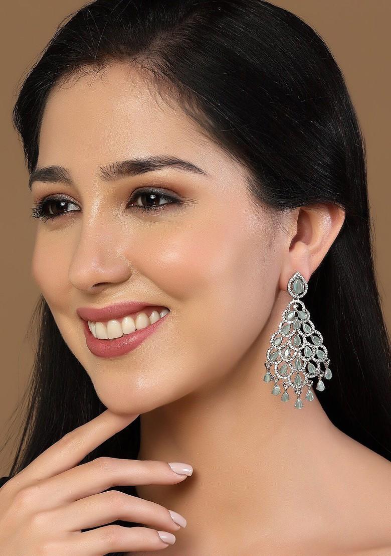 Silver Silver Plated Kundan Studded Teardrop Shaped Drop Earrings