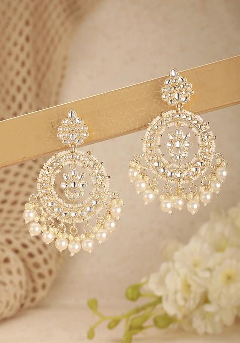 Gold Plated White Kundan And Pearl Studded Crescent Shaped Chandbalis