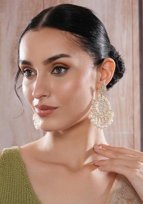 Gold Plated White Kundan And Pearl Studded Crescent Shaped Chandbalis