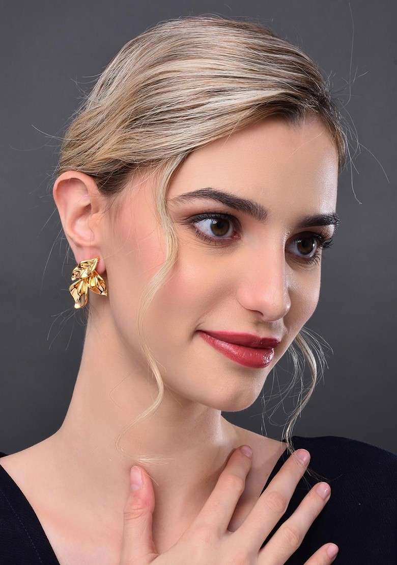 Gold Contemporary Feather Shaped Studs Earrings - Indya