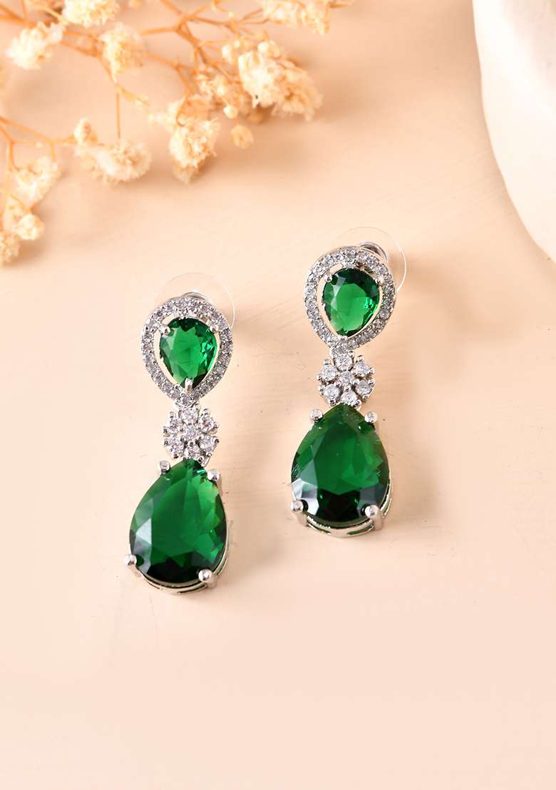 Silver Plated Green Stone Studded Floral Shaped Studs Earrings - Indya