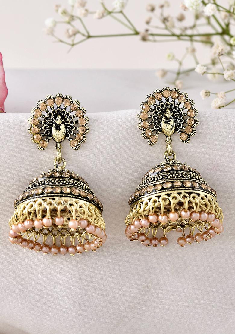Antique Gold Plated Jhumka Earrings With Floral Detailing And Stone Embellishments