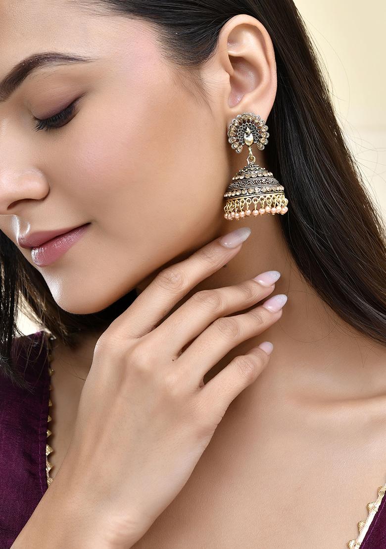 Antique Gold Plated Jhumka Earrings With Floral Detailing And Stone Embellishments