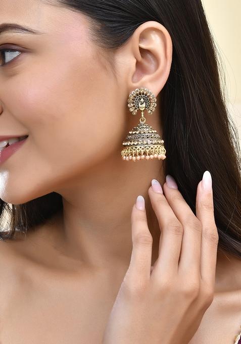 Antique Gold Plated Jhumka Earrings With Floral Detailing And Stone Embellishments