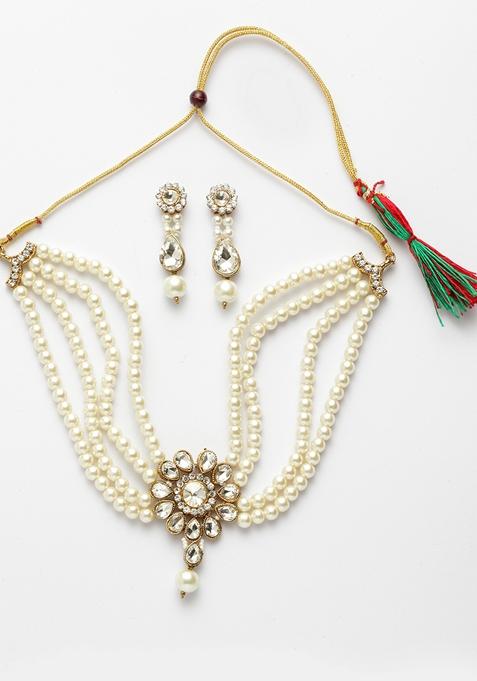 Stone Studded Floral Necklace And Earrings With Pearl Strings