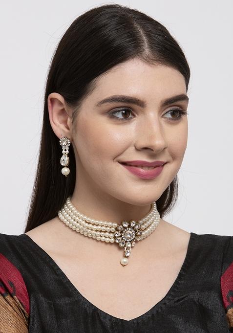 Stone Studded Floral Necklace And Earrings With Pearl Strings