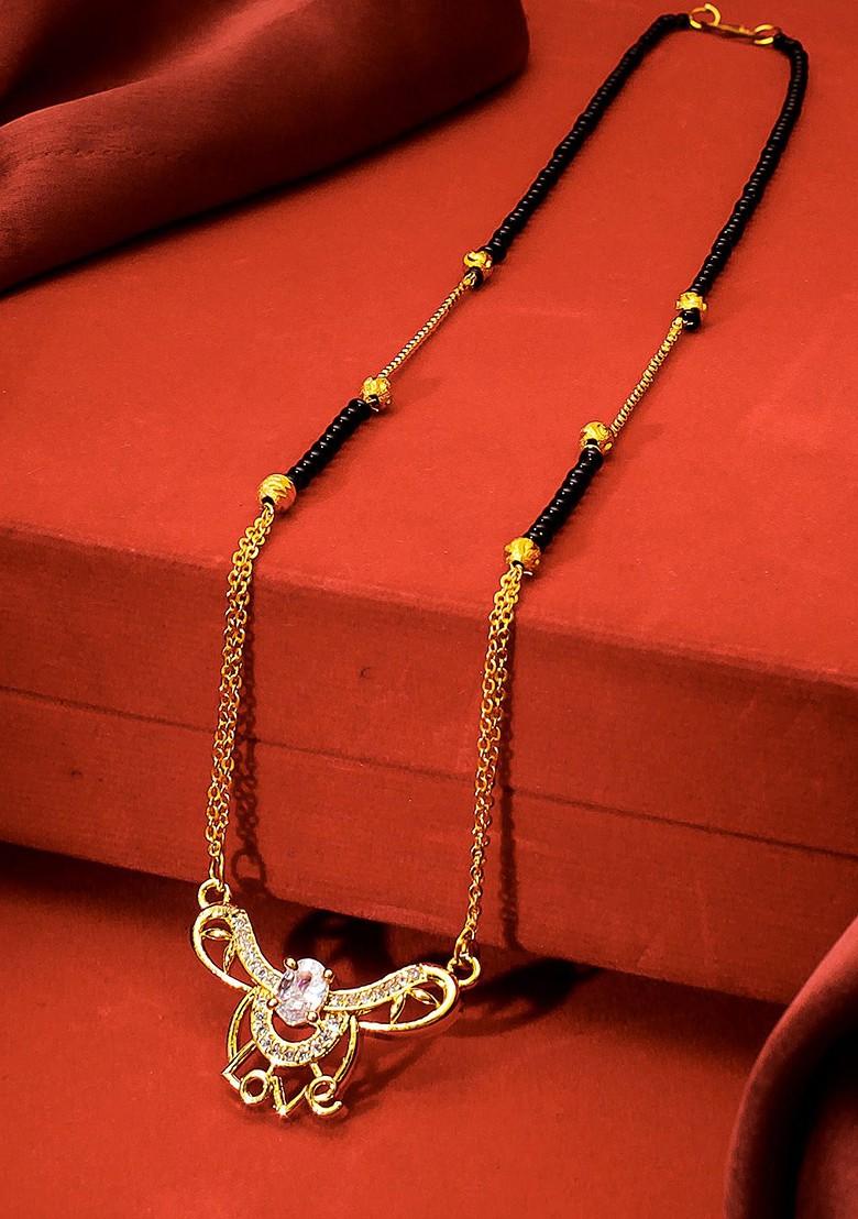 Gold Plated Black And White American Diamond Studded And Beaded Mangalsutra