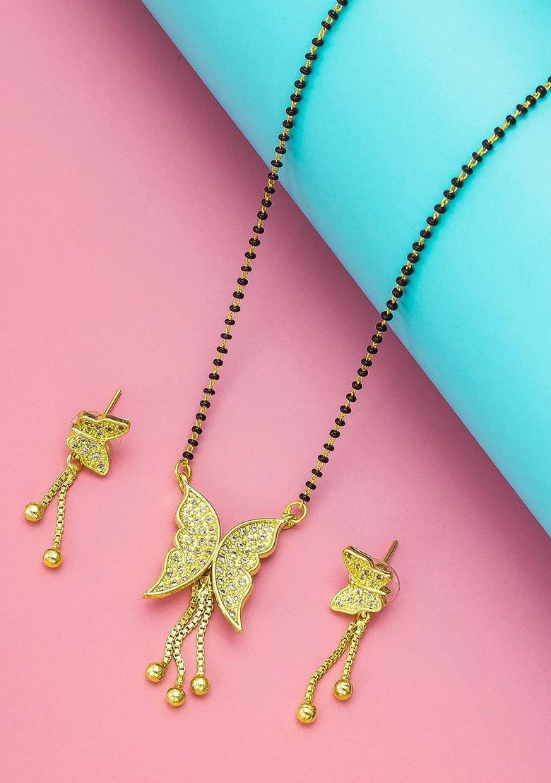 Gold Plated Black And White Ad Studded And Beaded Mangalsutra With Earrings