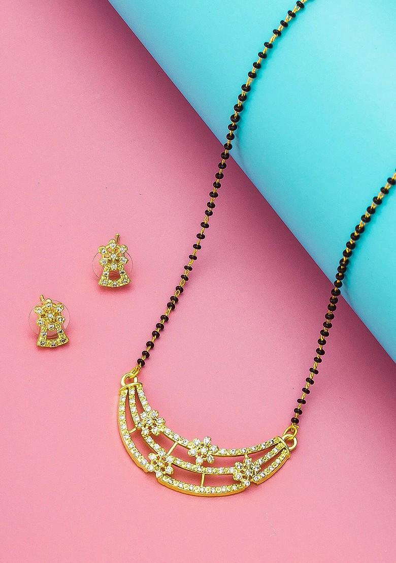 Gold Plated White And Black Ad Studded And Beaded Mangalsutra With Earrings