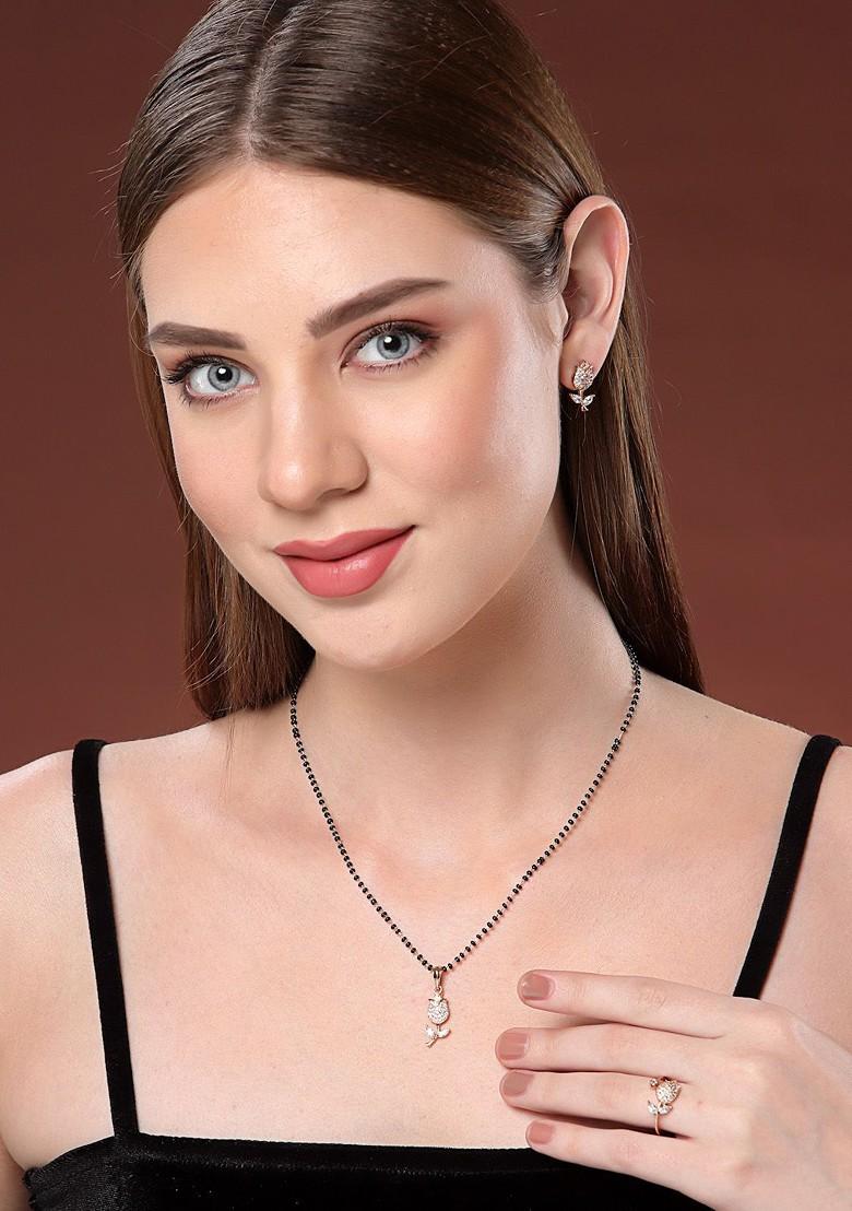 Gold Plated American Diamond Studded And Beaded Mangalsutra With Earrings And Ring