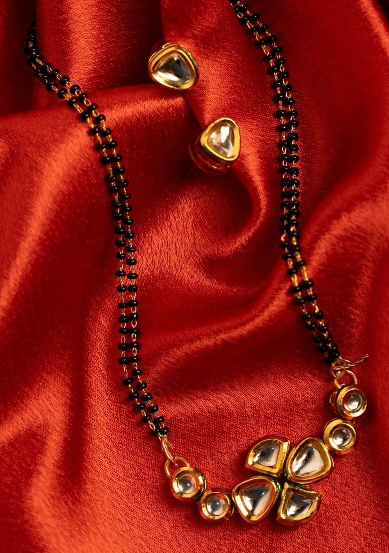 Gold Plated American Diamond Studded And Beaded Mangalsutra With Earrings