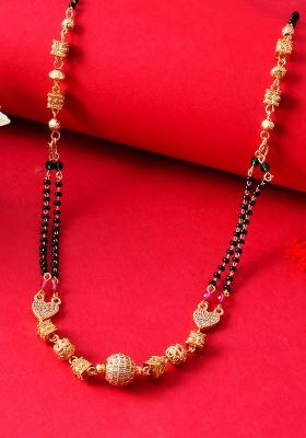Double Line Black Beaded Mangalsutra With Designer Gold And Toned Pendant

