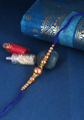 Red Kids Set Of 3 Gold And Rhodium Plated Pearls Beaded Thread Rakhis