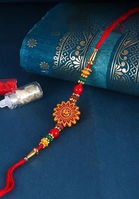Red Kids Set Of 3 Gold And Rhodium Plated Pearls Beaded And Om Thread Rakhis