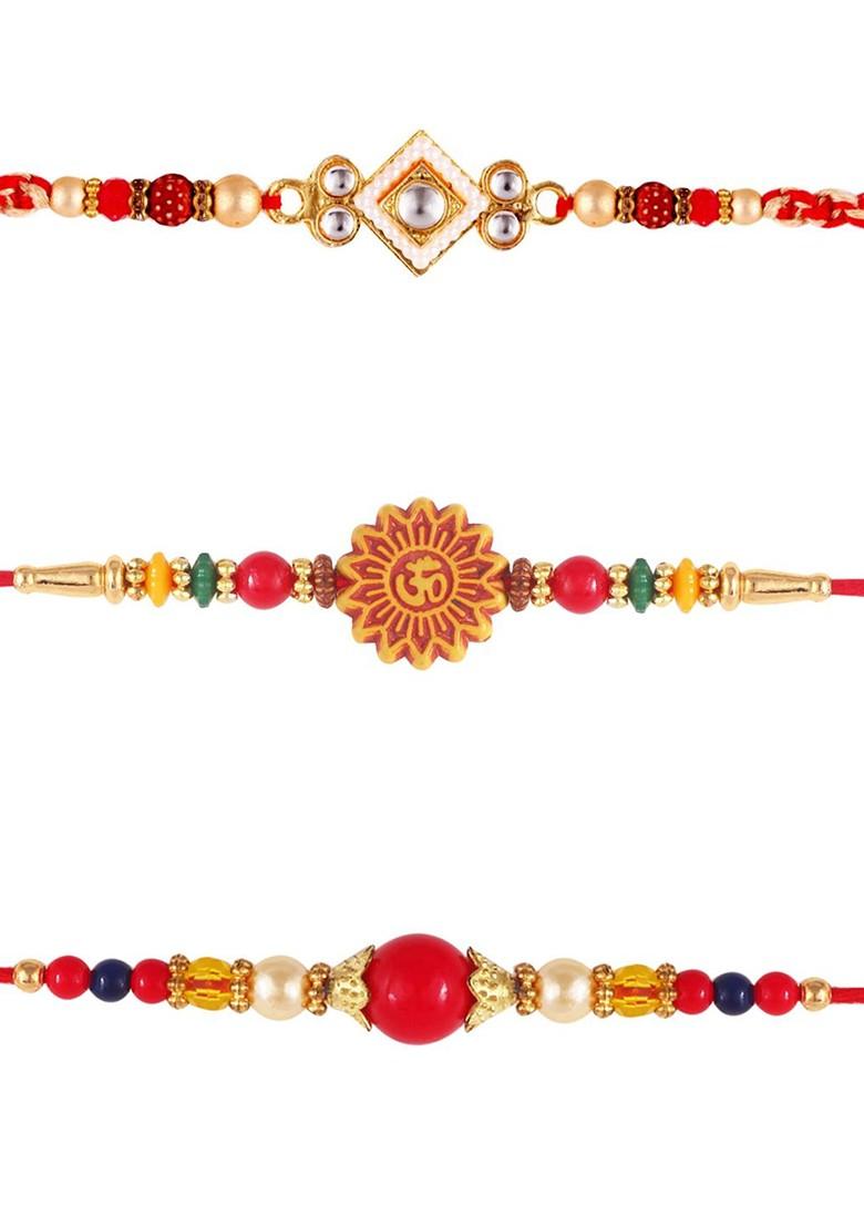 Red Kids Set Of 3 Gold And Rhodium Plated Pearls Beaded And Om Thread Rakhis