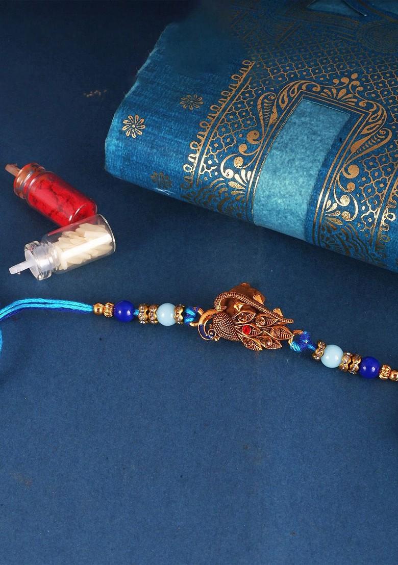 Red Kids Set Of 3 Gold And Rhodium Plated Ganesh Mayur And Peacock Thread Rakhis