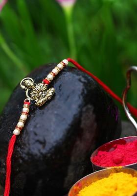 Gold Set Of 2 Charm Detail Rakhi For Women
