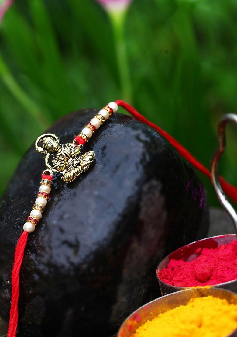 Gold Set Of 2 Charm Detail Rakhi For Women