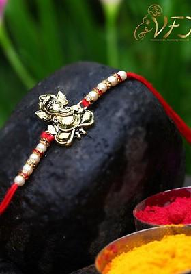 Gold Plated Lord Avighna Ganesha Charm Tie Up Rakhi For Women