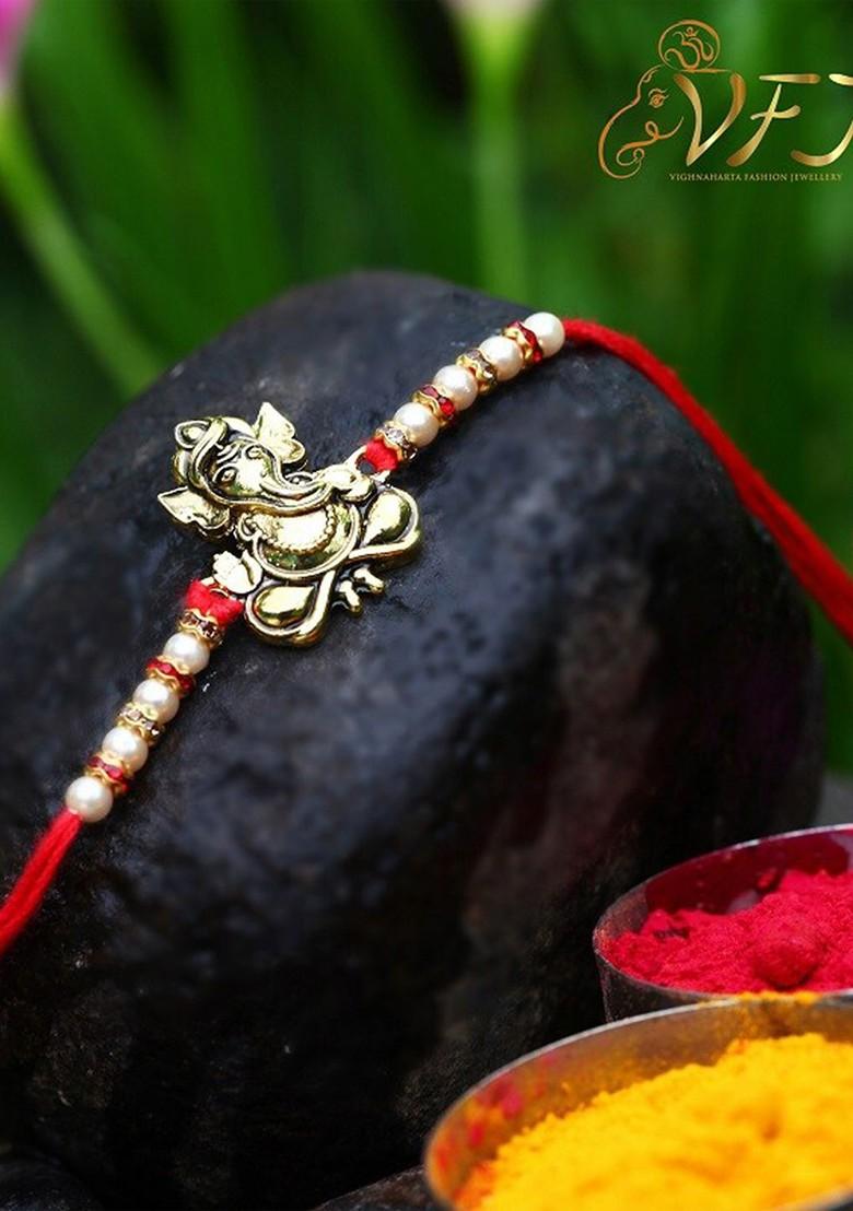 Gold Plated Lord Avighna Ganesha Charm Tie Up Rakhi For Women