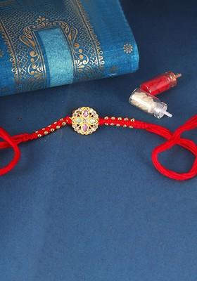 Gold And Rhodium Plated Cubic Zirconia Studded Thread Rakhi For Women