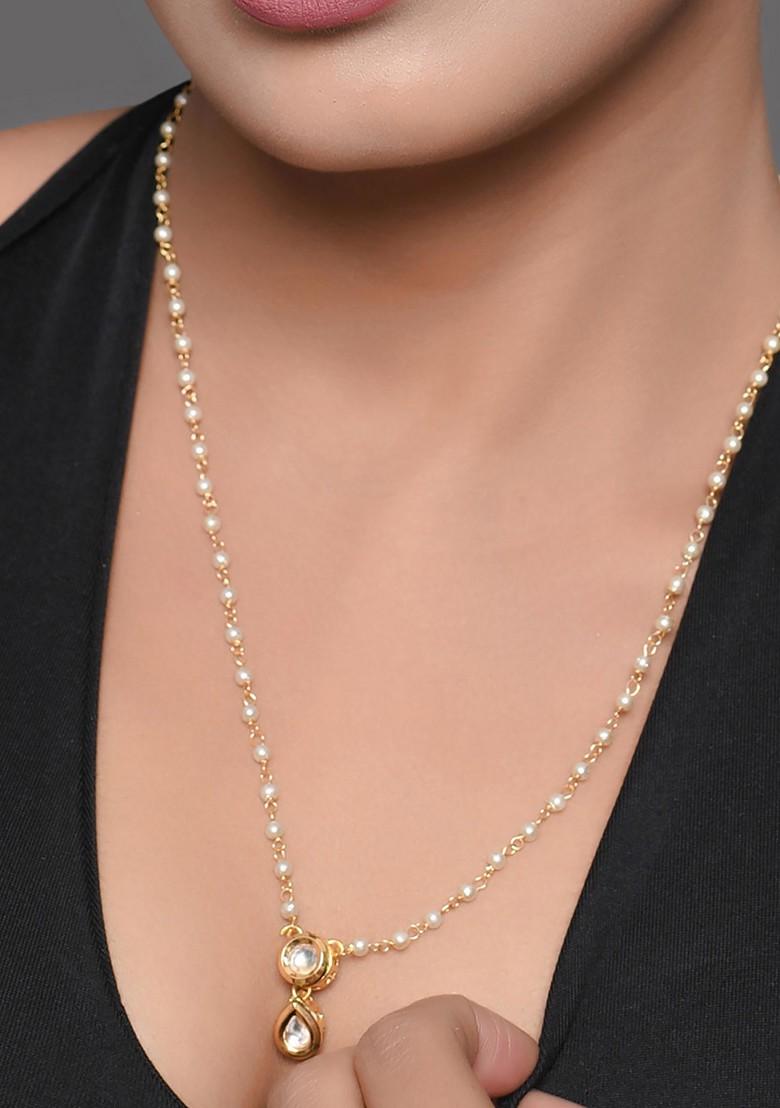 White Gold Tone Kundan Necklace And Earrings Set