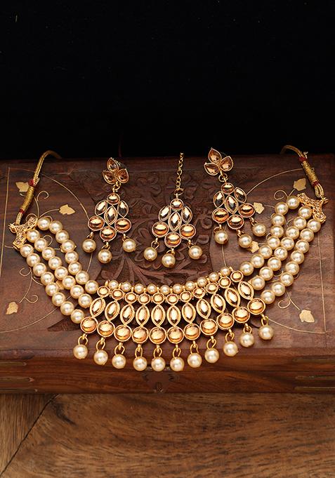 Tan Gold Plated Kundan Necklace Set With Maang Tikka